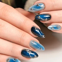 womans-hands-long-blue-chrome-600nw-2521386389